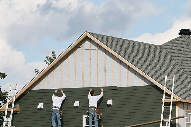 Professional Emergency Siding Repair technician working in Weirton, WV